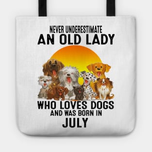 Never Underestimate An Old July Lady Who Loves Dogs Tote