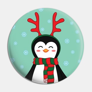 Merry christmas! Penguin with scarf and reindeer antlers. Pin