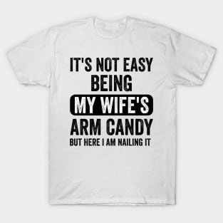 Funny i'm so tired of being my wife's arm candy meaning shirt, hoodie,  sweater, long sleeve and tank top