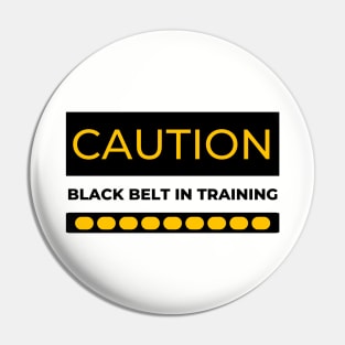 CAUTION Black Belt in Training Pin