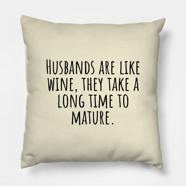 Husbands-are-like-wine,they-take-a-long-time-to-mature. Pillow by Nankin on Creme