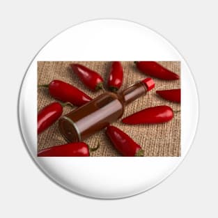 Hot sauce and chili peppers Pin