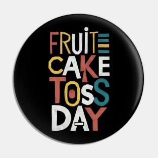 Fruitcake Toss Day Pin