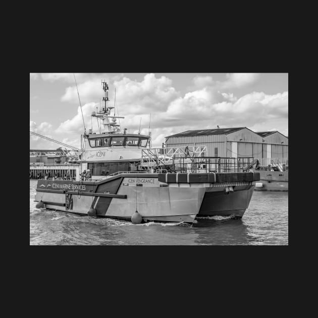 Crew transfer vessel motoring down the River Yare in Great Yarmouth, Norfolk by yackers1