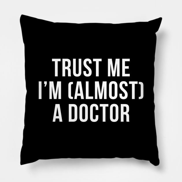 Trust me I'm (almost) a doctor. In white. Pillow by Alvi_Ink