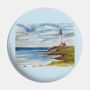 Lighthouse along the rocky shore Pin