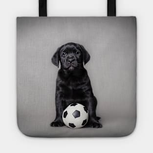 Labrador retriever puppy with ball Tote