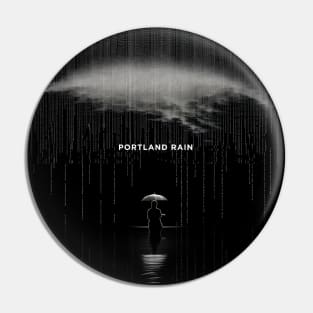 Portland Oregon Winter Rain: A person isolated under an umbrella in the pouring rain on a Dark Background Pin