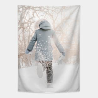 Child running in snow, backlight and throwing snow Tapestry