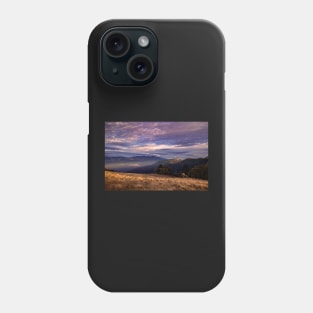 Sunset clouds over mountains Phone Case