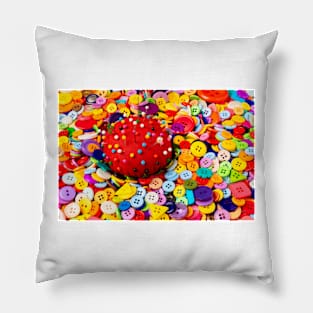 Pile Of Buttons And Red Pincushion Pillow