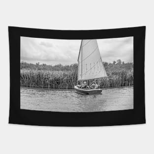 A couple sailing in the Norfolk Broads national park Tapestry