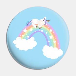 Cute unicorn laid on a rainbow Pin