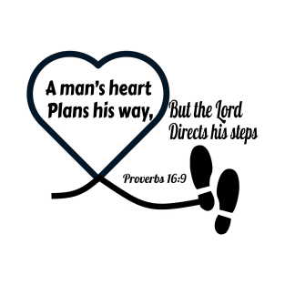 A Man’s Heart Plans His Way... Proverbs 16:9. Black lettering. T-Shirt