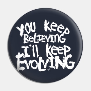 Believing vs. Evolving (wht) by Tai's Tees Pin