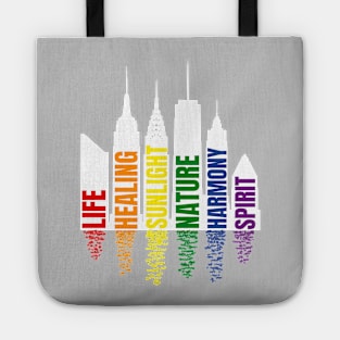 Pride colors and meaning in city silhouette, for dark background Tote