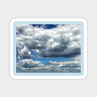 Picturesque white and grey cumulus cloud landscape Magnet