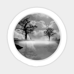 A calm lake in the fog in the morning in black and white Magnet