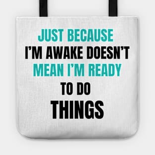 Just Because I'm Awake Doesn't Mean I'm Ready To Do Things. Light Blue and Black characters. Tote