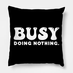 Busy doing nothing- white text Pillow