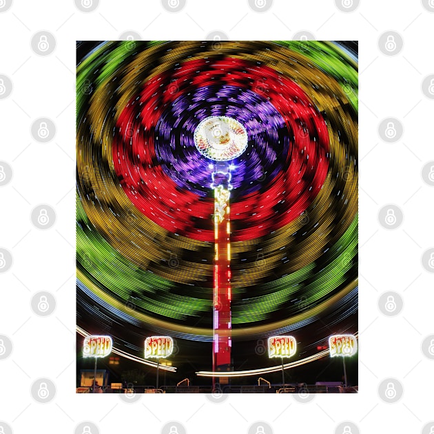 Colorful Abstract lights on a fair ride at night in Kansas. by ROBERTDBROZEK