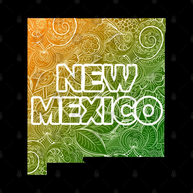 Colorful mandala art map of New Mexico with text in green and orange by Happy Citizen