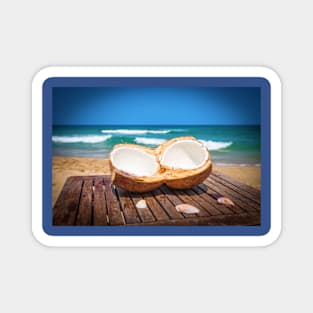 Coconut on the table against beautiful beach Magnet