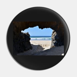 Ocean view through rock arch Pin