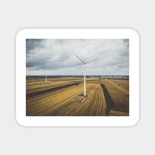 Aerial view of two windmills against cloudy sky Magnet