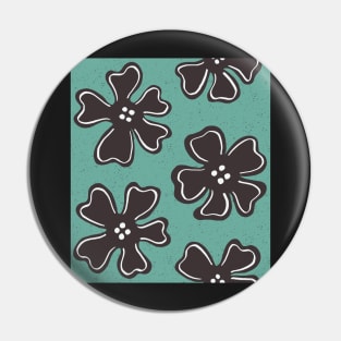 Pattern of button flowers on turquoise green Pin