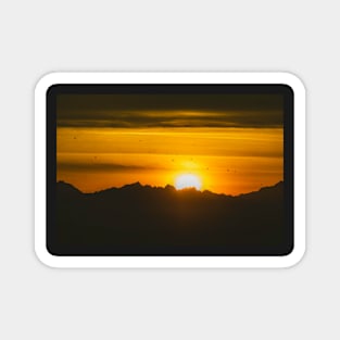 Sunset behind mountains Magnet