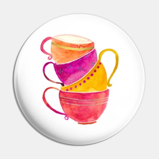 Pink, orange and yellow stacked tea cups Pin