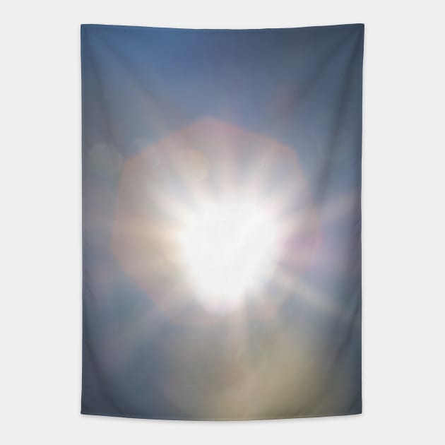 Lumina Solar Eclipse · white star like sun glare on clear blue sky with pink and yellow lens flares photograph Tapestry by natashakolton