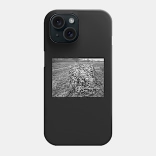 Ancient stone wall in a historical Roman camp in rural Norfolk, UK Phone Case