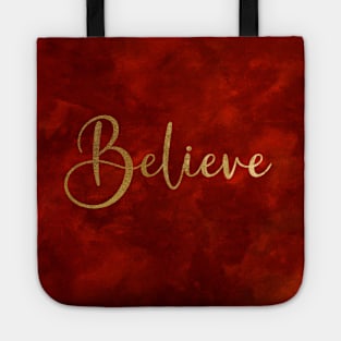 Believe Word Art in Gold Color Script Typography on red burgundy background Tote