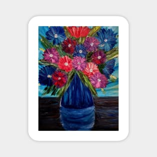 A lovely boutique of abstract vibrant bright colorful  flowers in a tall glass vase Magnet