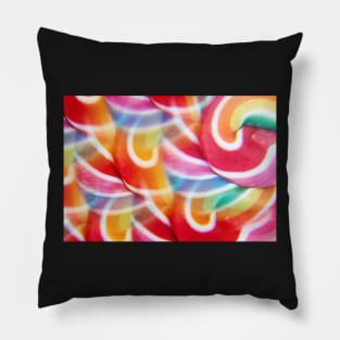 Close-up of swirly rainbow lollipop through prism filter Pillow