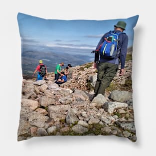 Climbers make their way up the steep path on Ben Nevis Pillow