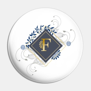 F, blue and gold initial monogram. Pin