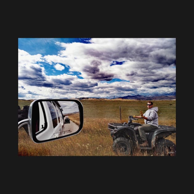 Canadian cowboy herder riding atv Alberta, Canada. by Nalidsa