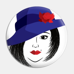 Lady wearing a blue hat with red rose Pin