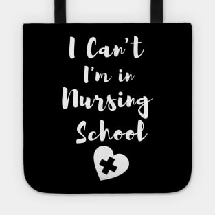 I Can't I'm in Nursing School in White text with heart design Tote
