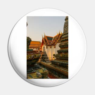 Fourth sidewalk view to ornate roof, flanked from parts of Chedis at Wat Pho. Pin