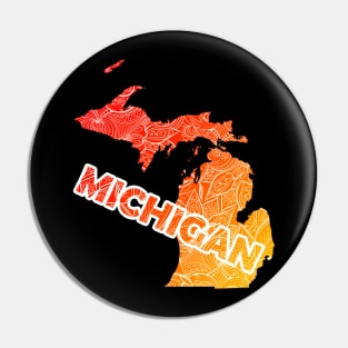 Colorful mandala art map of Michigan with text in red and orange Pin