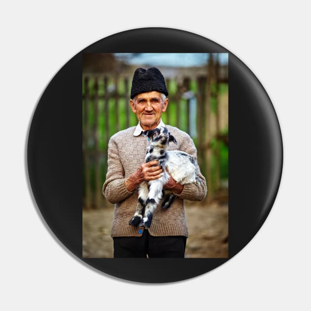 Old farmer with a baby goat Pin by naturalis