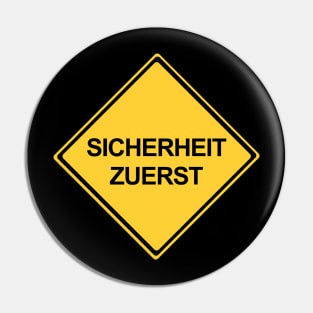 Safety First Sign in German, Sicherheit Zuerst Pin