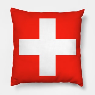 Red background white cross similar to the swiss flag. Pillow