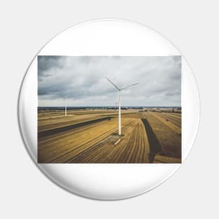 Aerial view of two windmills against cloudy sky Pin