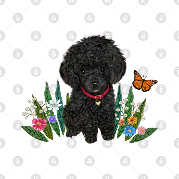 Black Fluffy Poodle Sitting on Grass with Flowers by Dogs Galore and More