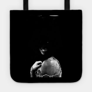 Special processing. Dark side. Girl with not visible face parts. Grayscale. Tote